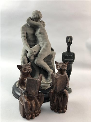 Lot 118 - A PAIR OF BRONZE EFFECT MODELS OF CATS READING, A MALE FIGURE AND A FIGURE GROUP