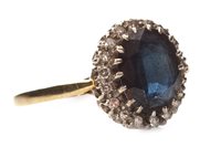 Lot 197 - A DARK BLUE GEM AND DIAMOND SET RING