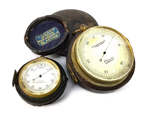 Lot 1429 - A 19TH CENTURY TRAVELLING SURVEYING ANEROID BAROMETER AND A POCKET BAROMETER