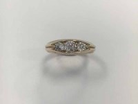 Lot 382 - VICTORIAN DIAMOND THREE STONE RING the...