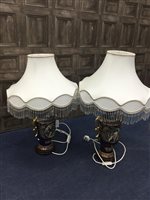 Lot 84 - A PAIR OF TWIN HANDLED LAMP BASES IN THE STYLE OF ROYAL VIENNA