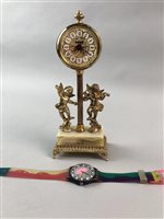 Lot 69 - A GILT METAL AND ONYX TIMEPIECE AND A SWATCH WATCH