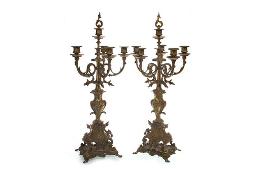 Lot 920 - A PAIR OF LATE 19TH CENTURY GILDED CAST METAL CANDELABRA