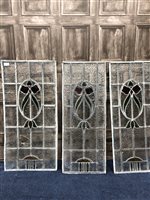 Lot 141 - A SET OF SIX STAINED AND LEADED GLASS PANELS