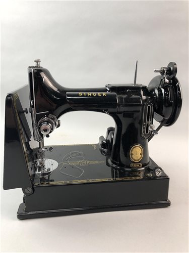 Lot 169 - A CASED SINGER 221K SEWING MACHINE