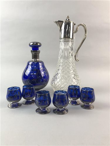 Lot 194 - A BLUE GLASS SILVER GILT DECANTER WITH SIX GLASSES AND A WATER JUG