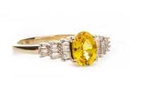Lot 170 - A YELLOW SAPPHIRE AND DIAMOND RING