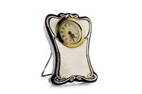 Lot 1431 - A GEORGE V SILVER CASED BEDROOM TIMEPIECE