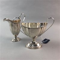 Lot 294 - A SILVER PLATED THREE PIECE COFFEE SERVICE AND A SILVER PLATED POT