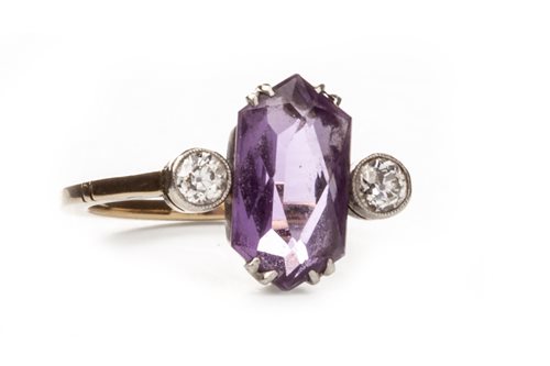 Lot 61 - AN EARLY 20TH CENTURY PURPLE GEM AND  DIAMOND RING