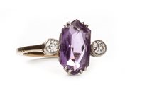 Lot 61 - AN EARLY 20TH CENTURY PURPLE GEM AND  DIAMOND RING