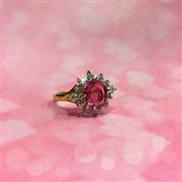 Lot 127 - A CERTIFICATED PINK SAPPHIRE AND DIAMOND CLUSTER RING