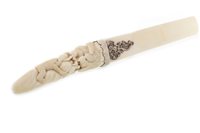 Lot 1134 - A JAPANESE CARVED IVORY PAGE TURNER