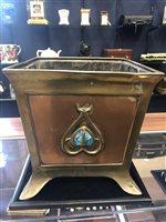 Lot 1610 - AN ARTS & CRAFTS BRASS AND COPPER SQUARE TAPERING PLANT POT