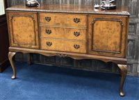 Lot 378 - A WALNUT DINING SUITE