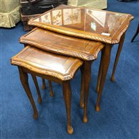 Lot 376 - A NEST OF MAHOGANY TABLES