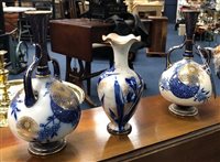 Lot 380 - A PAIR OF ROYAL DOULTON DOUBLE HANDLED VASES AND ANOTHER VASE