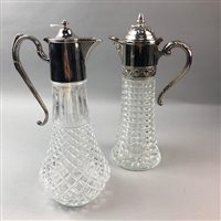 Lot 111 - A SILVER PLATED THREE PIECE TEA SERVICE, TWO CLARET JUGS AND AN ENTREE DISH