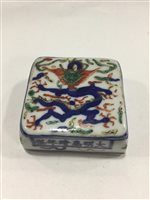 Lot 1093 - A CHINESE CERAMIC DESK WEIGHT