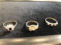 Lot 38 - A DIAMOND AND SAPPHIRE FLOWER HEAD RING AND TWO OTHER RINGS