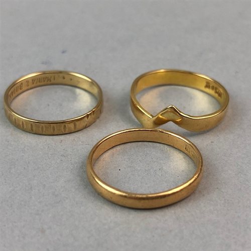 Lot 40 - A NINE CARAT GOLD BAND AND TWO OTHER RINGS