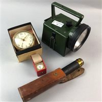 Lot 33 - A BRASS POCKET TELESCOPE, A MILITARY TORCH AND TWO SMALL CLOCKS