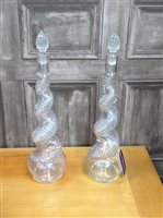 Lot 75 - A PAIR OF VICTORIAN GLASS SPIRAL TUNIST DECANTERS