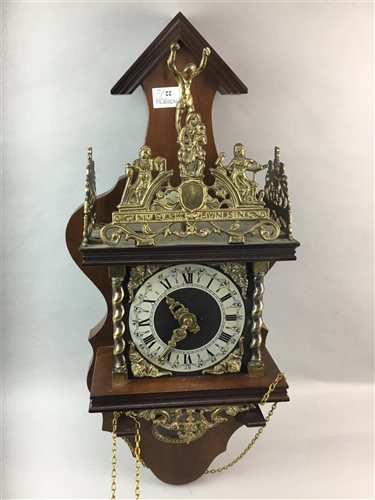 Lot 22 - A REPRODUCTION BRASS MOUNTED WOOD WALL CLOCK AND AN OAK BAROMETER