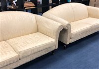 Lot 237 - A PAIR OF ARCH BACK SOFAS