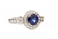Lot 12 - A SAPPHIRE AND DIAMOND CLUSTER RING