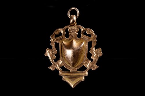 Lot 1994 - EARLY 20TH CENTURY GOLD FOOTBALL MEDAL