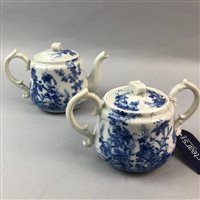 Lot 184 - A JAPANESE BLUE AND WHITE TEAPOT, SUGAR BOWL AND A WEMYSS CAT PAPERWEIGHT