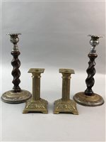 Lot 326 - A LOT OF TWO PAIRS OF BRASS CANDLESTICKS AND ANOTHER PAIR