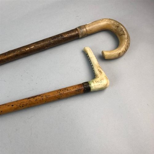 Lot 263 - A RAM'S HORN HANDLED WALKING STICK AND A WALKING CANE
