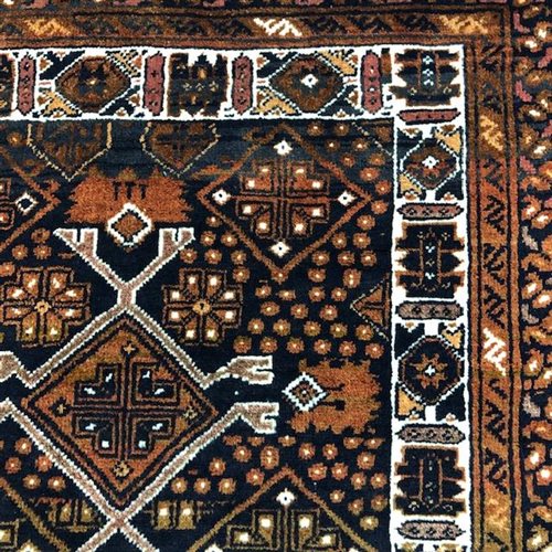 Lot 267 - A PERSIAN FRINGED AND BORDERED RUG