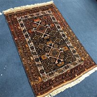 Lot 267 - A PERSIAN FRINGED AND BORDERED RUG