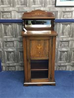 Lot 375 - A ROSEWOOD MUSIC CABINET