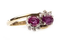 Lot 211 - A RED GEM AND DIAMOND RING