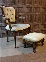 Lot 360 - A FRENCH DESIGN ELBOW CHAIR AND A SIMILAR FOOT STOOL