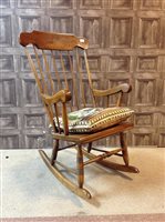 Lot 361 - A STAINED WOOD ROCKING ARMCHAIR AND A PIANO STOOL