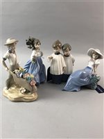 Lot 428 - A SPANISH FIGURE AND THREE NAO FIGURES OF CHILDREN