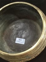 Lot 427 - A CHINESE BRASS RINGING BOWL