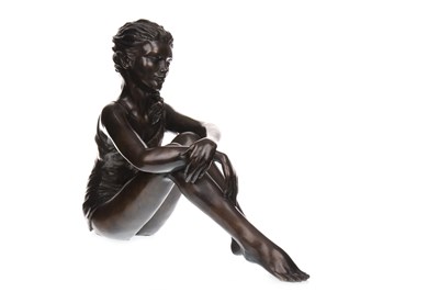 Lot 1772 - A BRONZE SCULPTURE OF SEATED GIRL