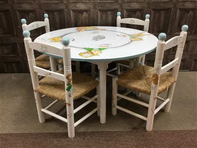 Lot 1855 - A CHILDREN'S NURSERY CIRCULAR TABLE AND FOUR CHAIRS