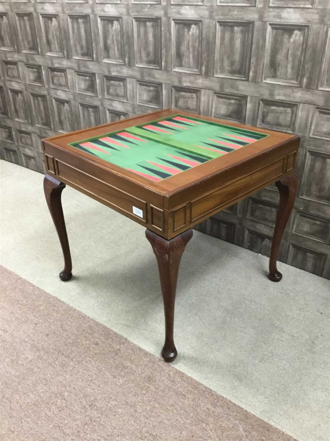 Lot 1771 - A 20TH CENTURY MAHOGANY GAMES TABLE