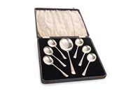 Lot 879 - A SET OF GEORGE V SILVER DESSERT SPOONS WITH SERVING SPOON
