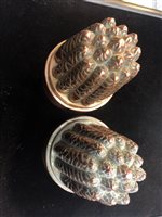 Lot 1650 - A PAIR OF VICTORIAN COPPER CIRCULAR JELLY MOULDS