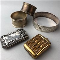 Lot 4 - A PAIR OF SILVER NAPKIN RINGS, TWO VESTA CASES AND A SILVER BANGLE
