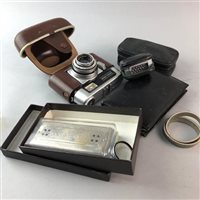 Lot 49 - A ZEISS IKON CAMERA, ARISTO RULER, TWO HARMONICAS AND COINS