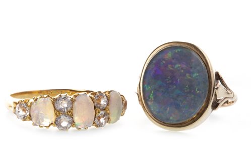 Lot 19 - AN OPAL AND GEM SET RING AND ANOTHER